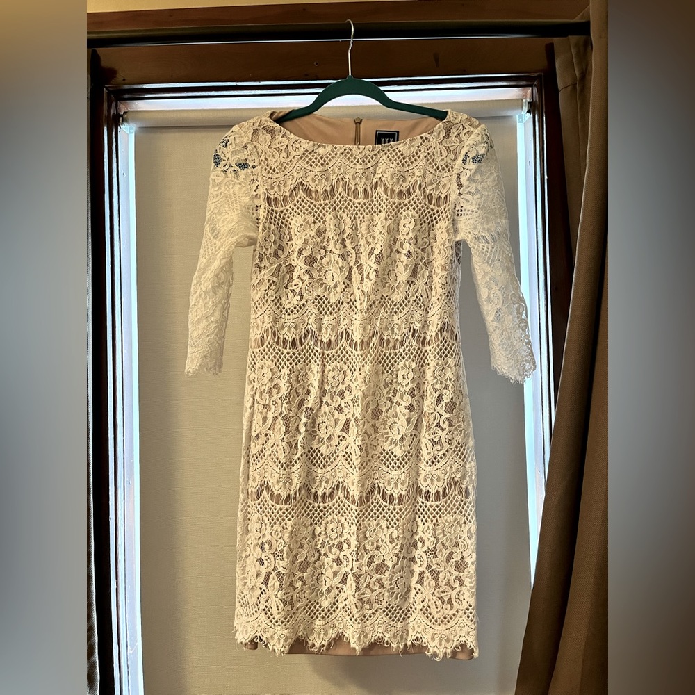 White lace 3/4 sleeve knee length dress. JH brand size 6, worn once.